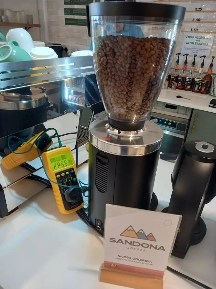 Coffee grinder being tested in a cafe