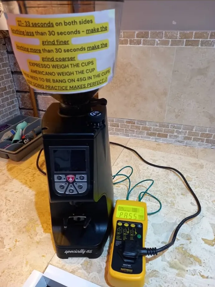 Commercial coffee grinder being PAT tested