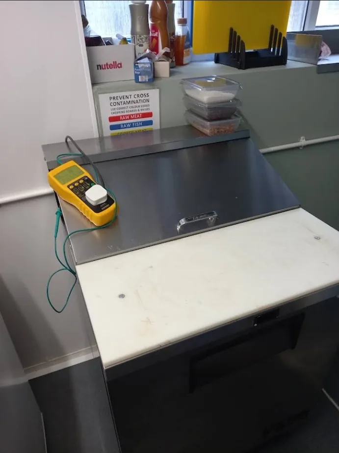 Commercial freezer being tested in a food preparation area