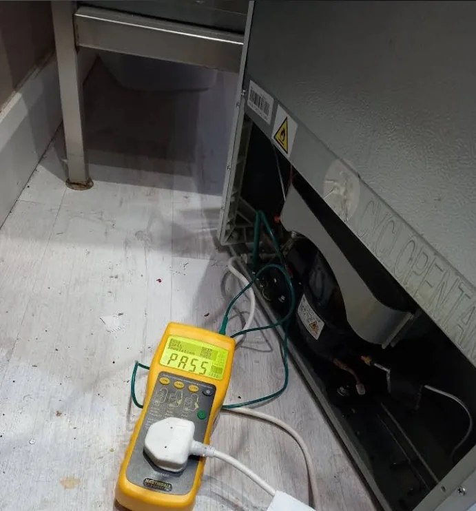 Refrigeration equipment being PAT tested